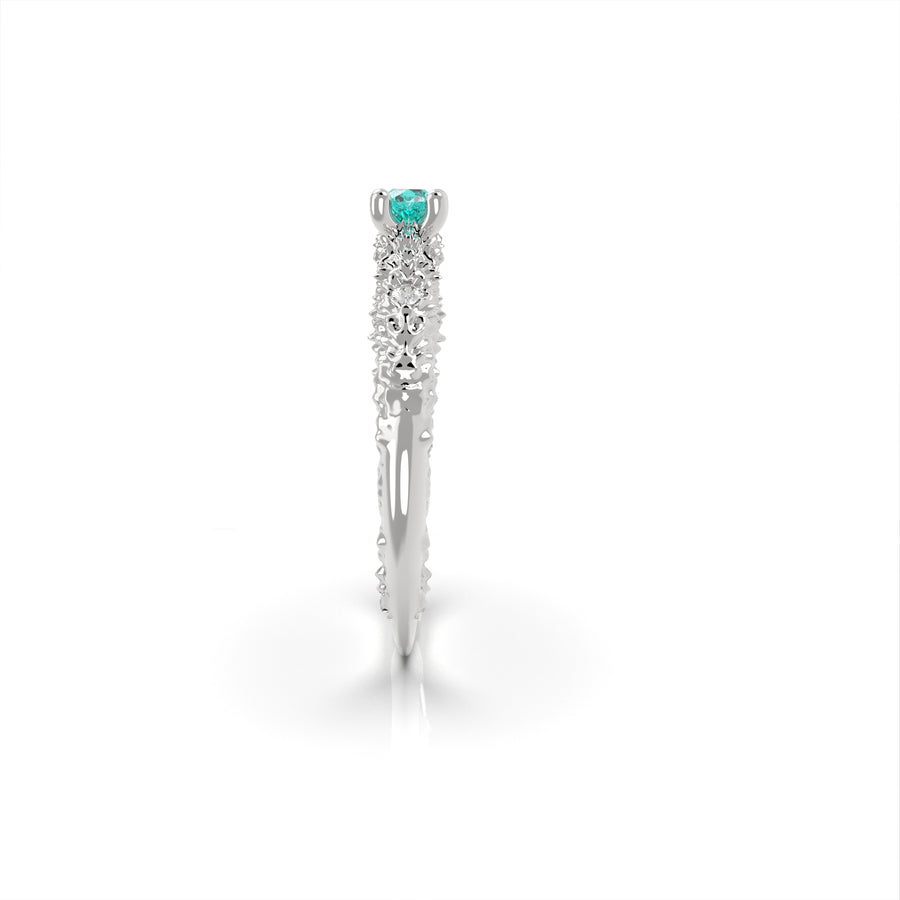 Nacre Passion - designer engagement ring made of 14 kt gold 2.69 g, two diamonds and a Colombian Coscuez emerald 0.14ct