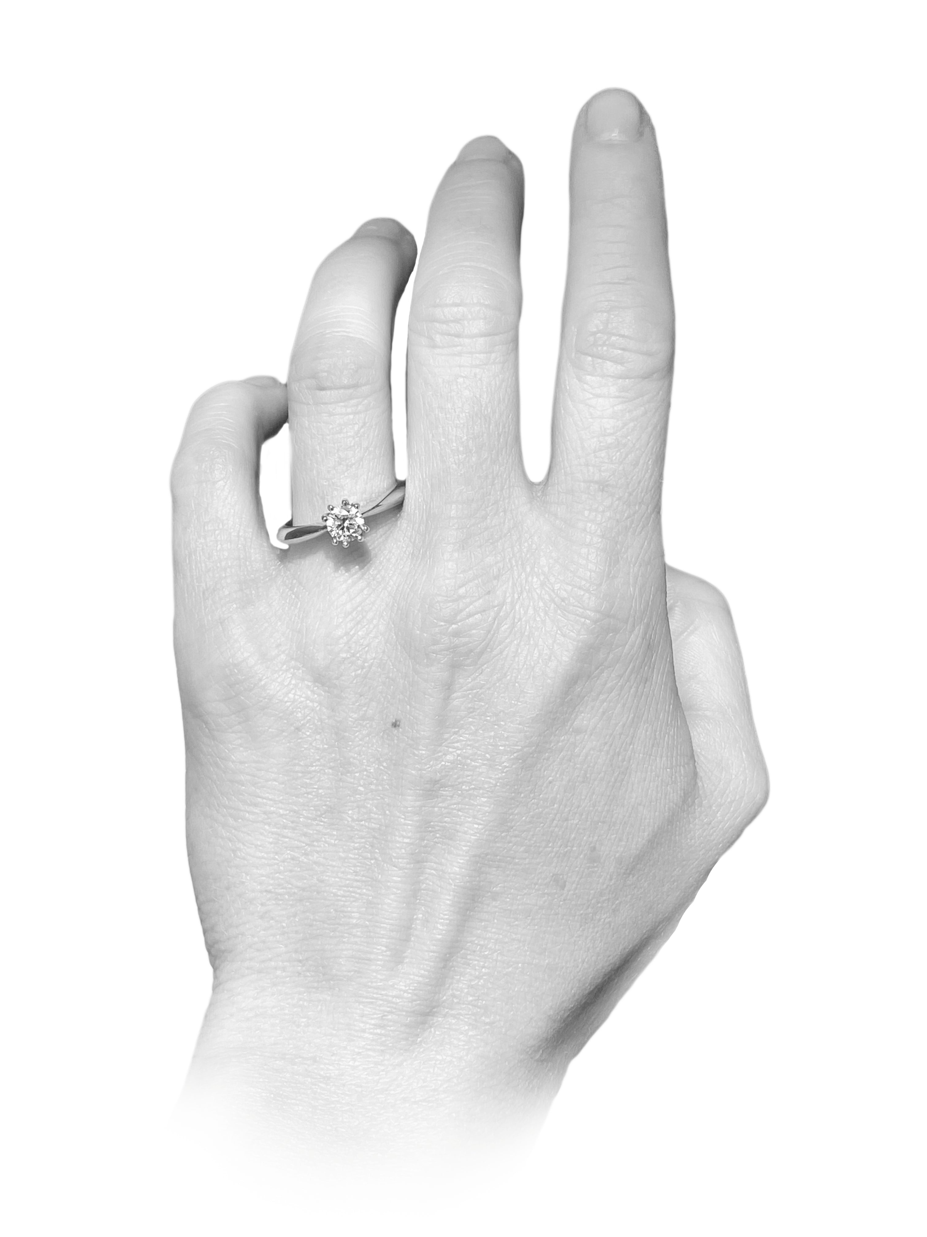 Teneritas - designový zásnubní prsten ze žlutého a bílého zlata se solitérním 0,50ct briliantem SI1/G / 18kt váha cca 3,85 g - antonielecher